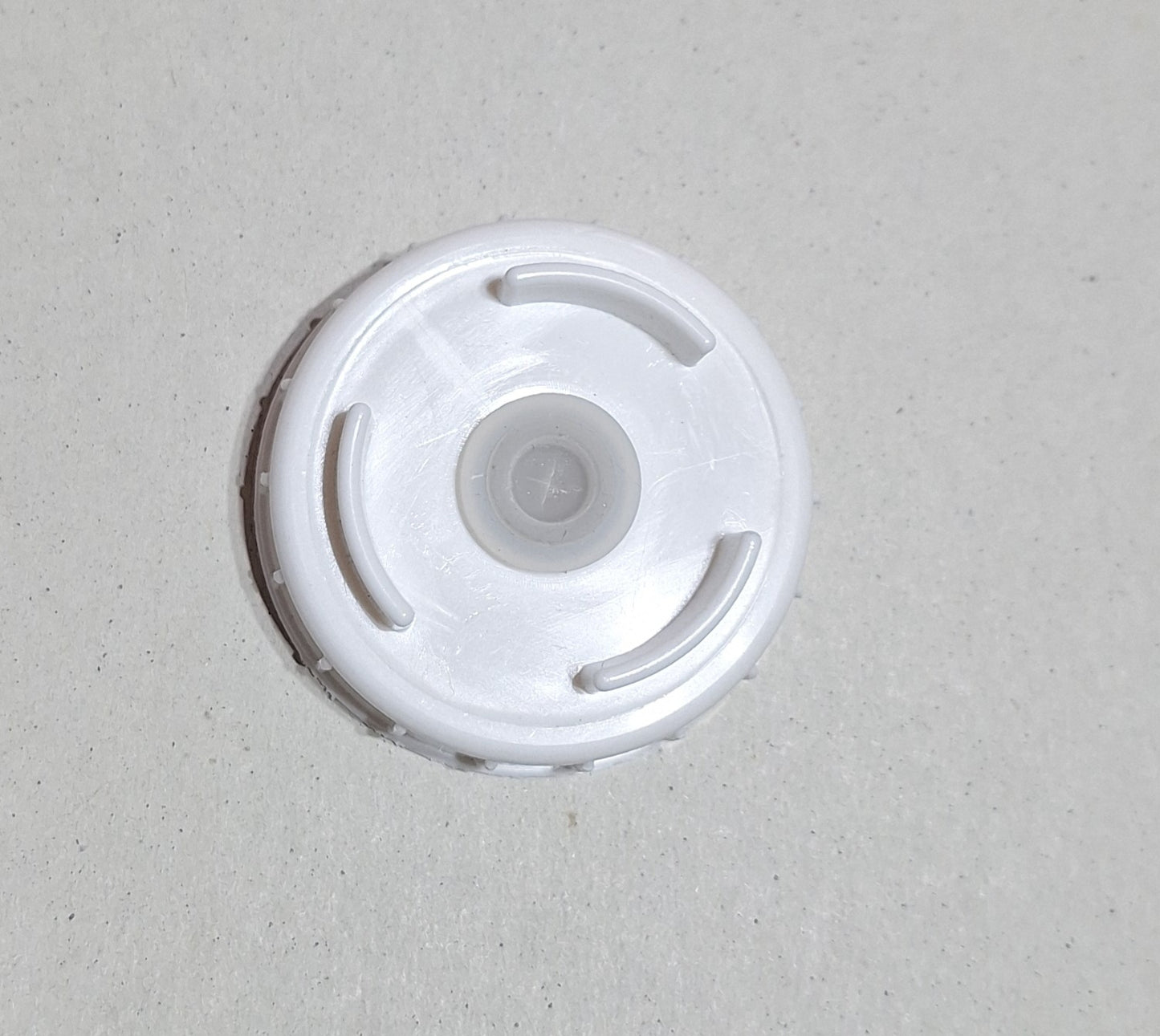 Dispensing End Cap for a FIFO squeeze bottle