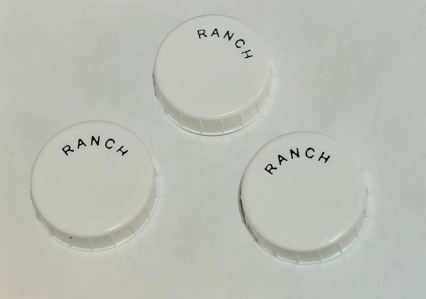 Imprinted Fill End Caps for FIFO Squeeze Bottles